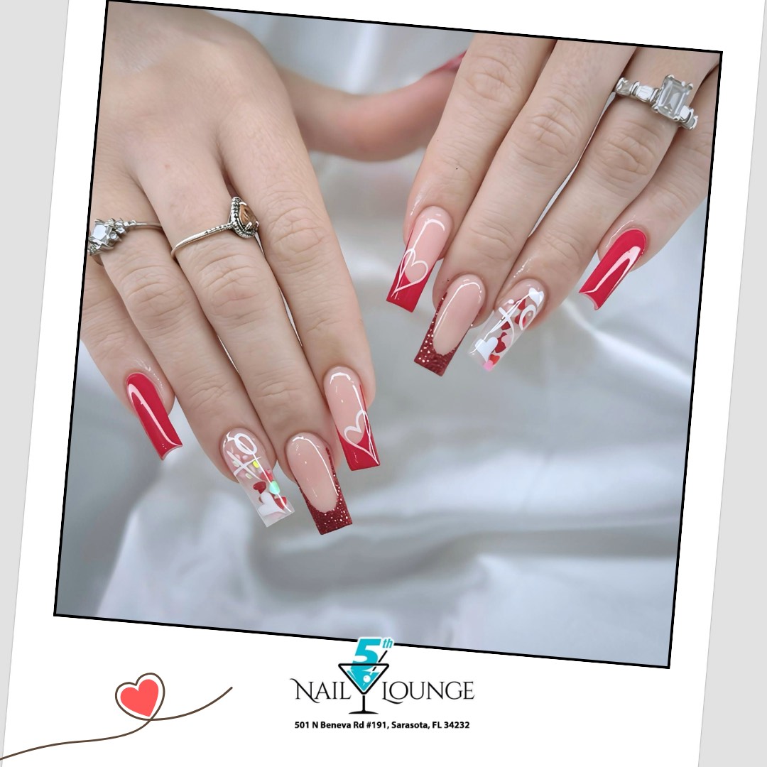 Red and nude coffin nails with hand-painted Valentine heart accents